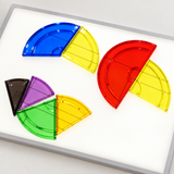 Translucent geometric pieces on an illuminated light panel